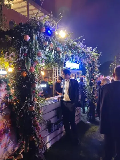 Guests mingling at the Belgian King's Day event. Our goal is to create an atmosphere where hosts and guests alike can relax and enjoy the celebration, knowing the food and service are in expert hands.