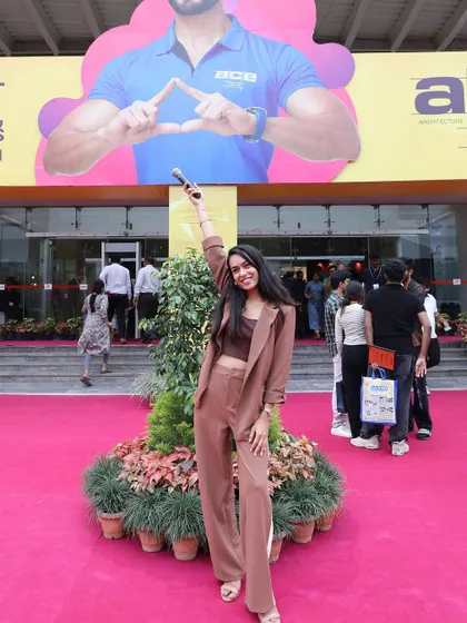 Mic in hand and ready to go on Day 2 of the ACETECH exhibition. My job is to keep the energy high and the audience engaged throughout the entire event.