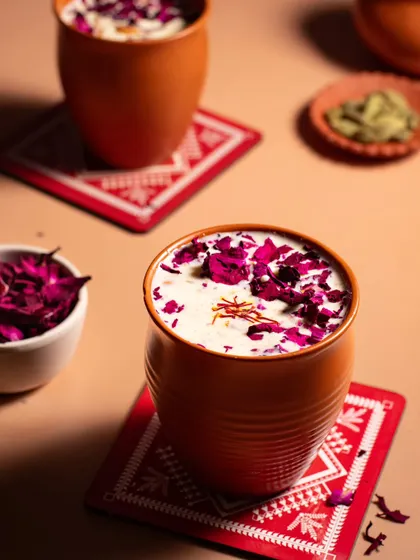 A refreshing glass of Thandai, the signature drink of Holi. We styled this shot with vibrant colors and traditional glasses to capture the joyful and energetic spirit of the festival.