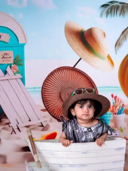 Some memories are made in the sand and sealed with a smile. Our beach theme is full of fun props.