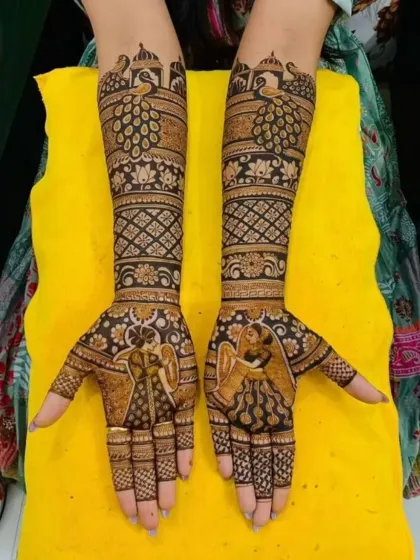 A unique take on the bridal portrait, this design shows the bride holding an elephant's trunk, a symbol of good luck and prosperity.