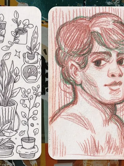 A page of botanical doodles next to some portrait studies. My sketchbook is a playground for any idea that comes to mind.