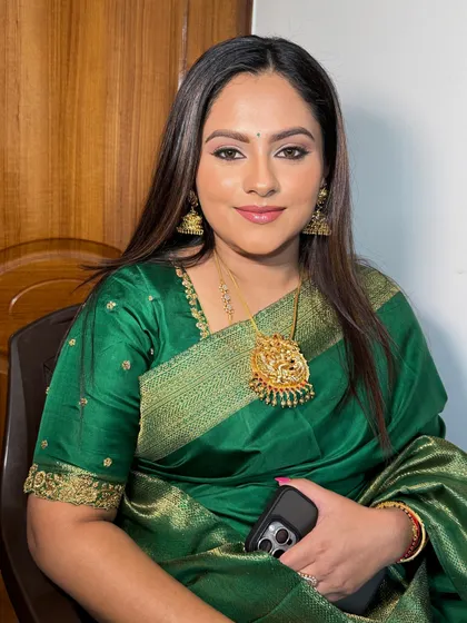 A smiling portrait of Varsha. She looks fresh and radiant.