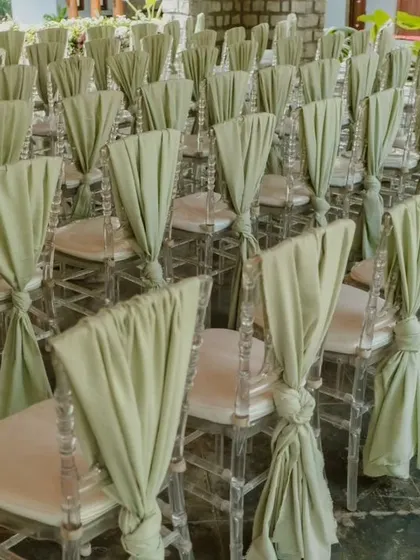 A closer look at the knotted sashes, a small detail that adds a touch of texture and sophistication to the guest seating.