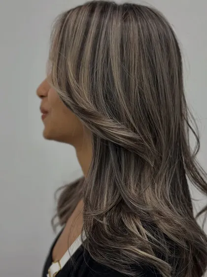 Another side profile, capturing the elegance of the ash tones and soft layers.