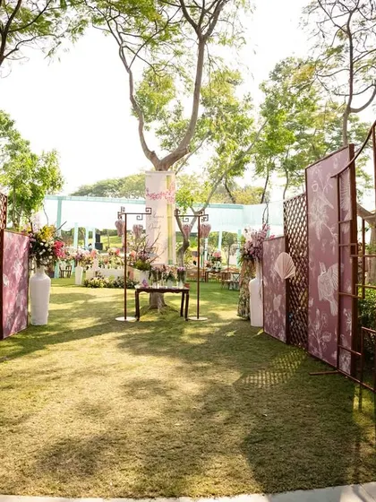 Another view of the entrance to the 'Whispers of the Orient' carnival, showing the custom-printed panels and latticework.