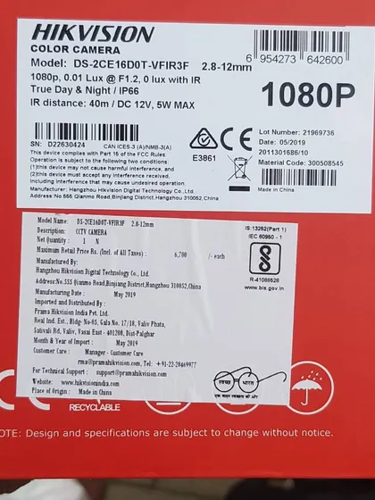 The specification label on a Hikvision color camera box, detailing its 1080p resolution and IR distance.