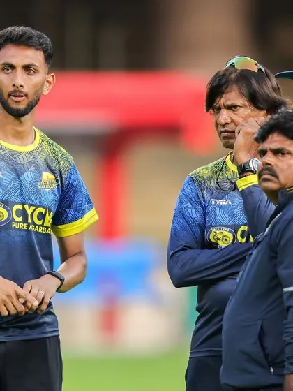 A serious discussion on the field with my coaching staff and players. Tactical adjustments during practice are vital for match day success.