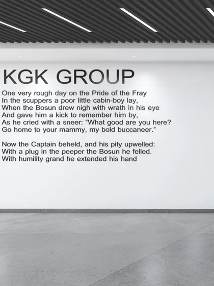 This entrance foyer for the KGK Group uses typography as a design element. The minimalist white wall provides a clean backdrop for the company's branding, creating a bold and modern statement right at the entrance.