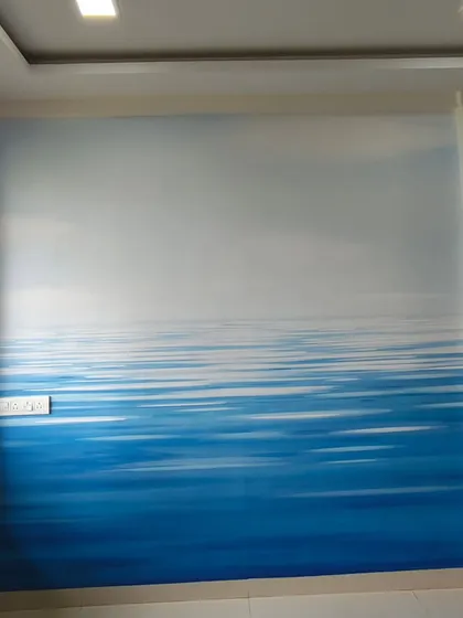 A minimalist ocean and sky mural installed in a Bandra home. The simplicity of the design required a perfectly smooth and seamless application to achieve the calming effect.