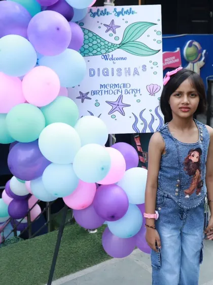 A warm welcome to a Mermaid Birthday Bash. The custom welcome sign and pastel balloon arch create an enchanting entrance for the birthday girl and her guests.