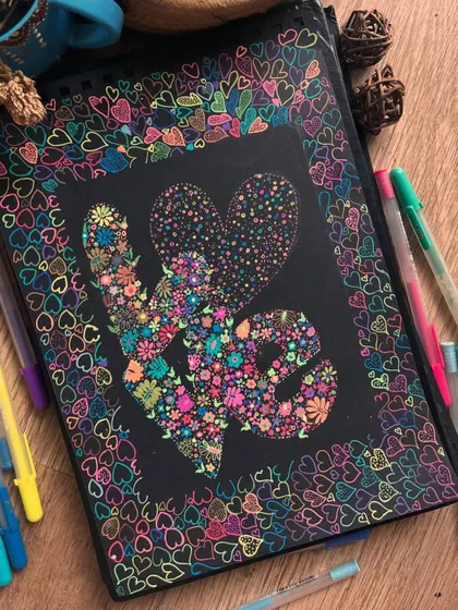 The word "LOVE" created from a garden of tiny, colorful flowers using the dot art technique. A perfect piece to express love and fill a space with joy.