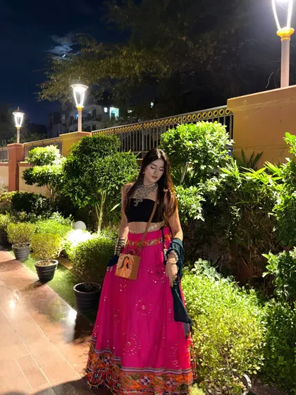 A full-length shot of the colorful and fun Navratri outfit.