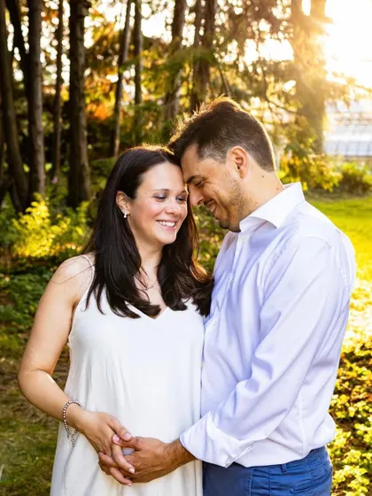 Another beautiful moment from this couple's golden hour photoshoot. The soft light and natural setting make for such warm and authentic pregnancy photos.