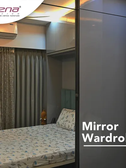 A mirror wardrobe is a smart choice for smaller bedrooms as it makes the space feel larger and brighter. This one has a sleek grey finish.