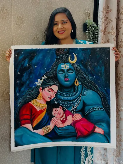 Here I am with my completed Shiv Parivar acrylic painting on a 24x24 inch canvas. This handmade piece, showing the holy family, is available for purchase.