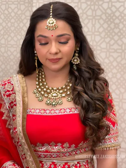 Another view of the classic half-up style, showing the beautiful volume and soft curls.