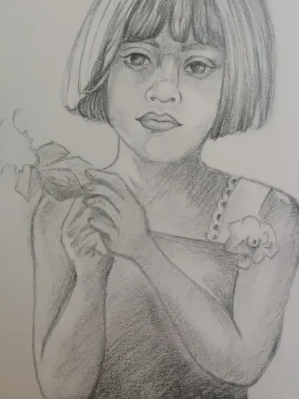 Sketching is the foundation of so much art, and I teach my students to see the world in lines and shadows. This beautiful pencil portrait was done by a student learning to capture expression and detail. It is a wonderful example of the realistic drawing skills we practice in our weekly lessons.