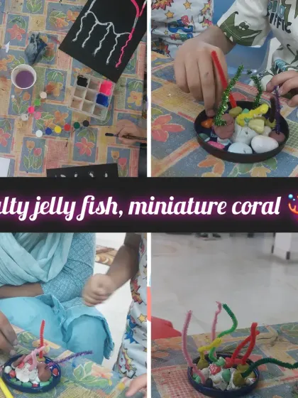 A closer look at the "Salty Jellyfish" and miniature coral crafts. This activity involved using different textures like pipe cleaners and pebbles to create a multi-sensory art piece.
