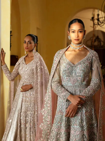 Two models styled in complementary pastel gowns with intricate embroidery and cape details. This demonstrates my approach to creating a harmonious visual story for a brand campaign or a bridal party.