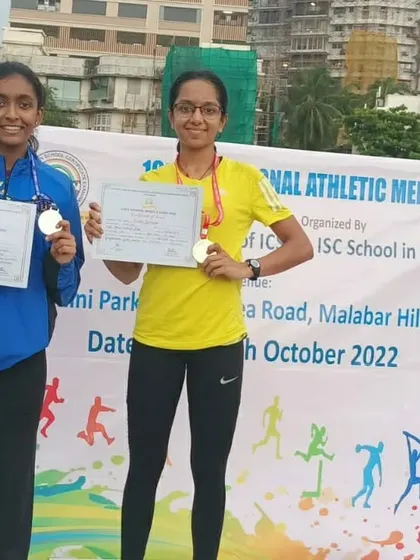 My athletes Prisha and Eekisha with their silver and gold medals from the 800m run.