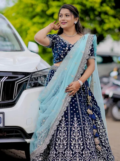 Another angle of this gorgeous client in her navy blue velvet lehenga. The silver embroidery catches the light beautifully.