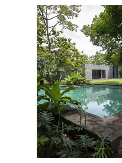 Sense of place is a key ingredient. Nestled within a grove in Alibaug, this villa embraces the trees it occupies, delivering an alfresco living space under the natural canopy where life is lived out of doors.