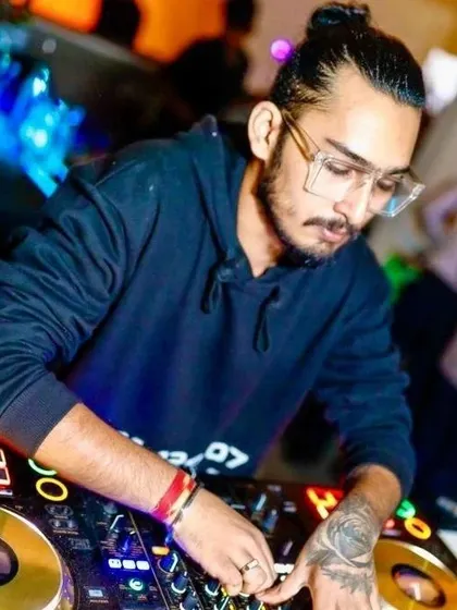 Here I am at a Wednesday night event, focused on delivering a seamless mix of Bollywood and commercial hits.