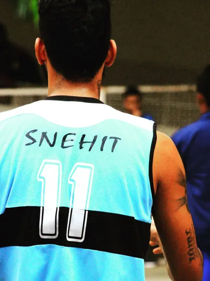 A shot from behind showing my jersey from my college basketball team. This represents a formative period in my life where I lived and breathed competition.