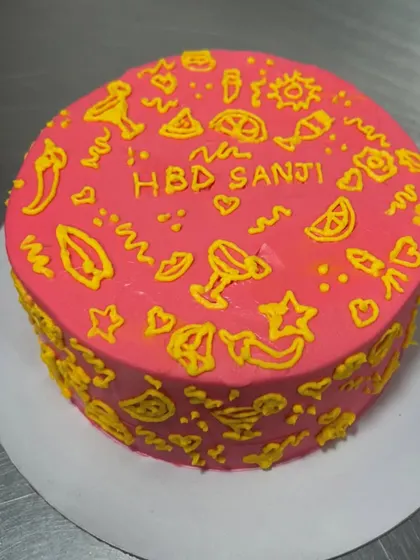 I was trying to do some intricate piping work on this cake and my shaky hands had other plans, but I still like how it turned out. It's a bright, fun, and effective design for a birthday.