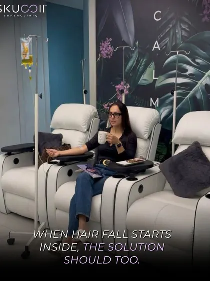 Sometimes, the solution to hair fall begins from within. This client is relaxing in our private lounge while receiving a customized IV drip, formulated with essential vitamins and nutrients to target the root causes of hair loss.