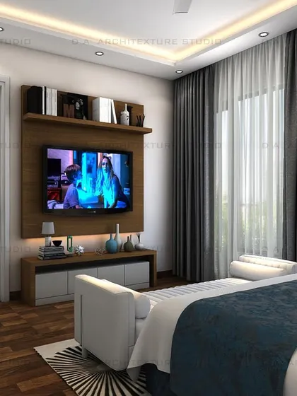 A view of the TV unit and a green sofa in the same bedroom, showing how I use color to create distinct zones within a single room.