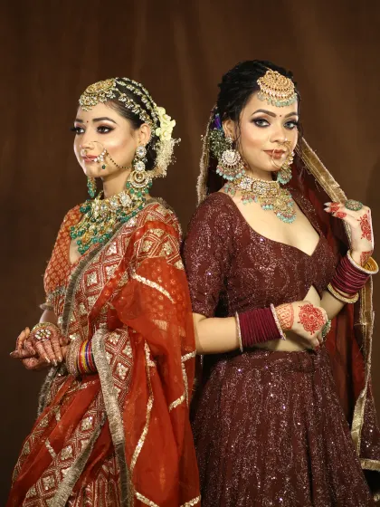 Two brides, two different looks, both stunning. This photo shows the versatility in my work, creating unique styles for each individual client.