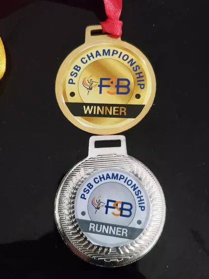We award custom medals for our PSB Championship, with distinct designs for the "Winner" and "Runner" to celebrate the top performers.