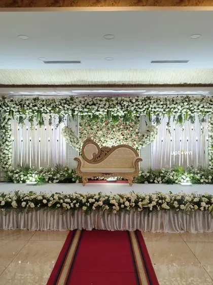 A full view of the elegant white floral backdrop.