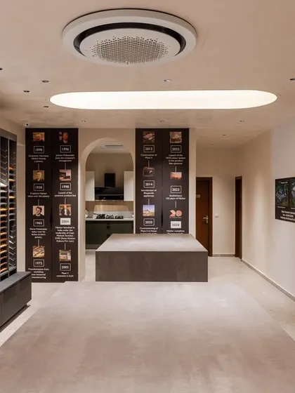 The journey of our 20 years in India is displayed alongside our material library in the Delhi showroom, telling the story of our brand's evolution.