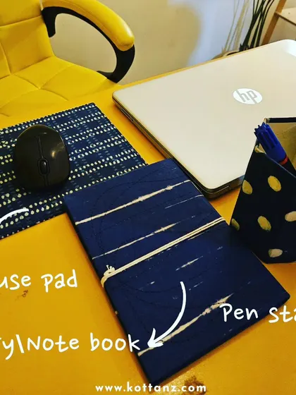 Our range of desk essentials is made using rural ethnic crafts by local women artisans. This set includes a mouse pad, diary, and pen stand, perfect for corporate gifting that empowers communities.