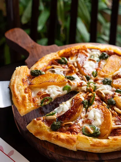 A unique pizza with figs and pesto. We love shooting unconventional dishes and highlighting their unique ingredients.