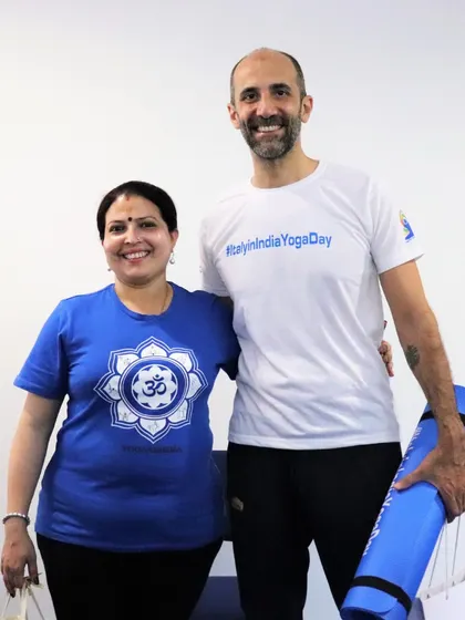 A journey that transcends boundaries. Here I am with a student, embodying the global community and shared harmony that Iyengar yoga fosters.