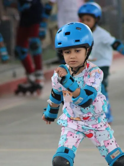 Fully geared up and ready to roll. This photo captures the dynamic energy of our young skaters as they put their practice into action during a fun competition day.