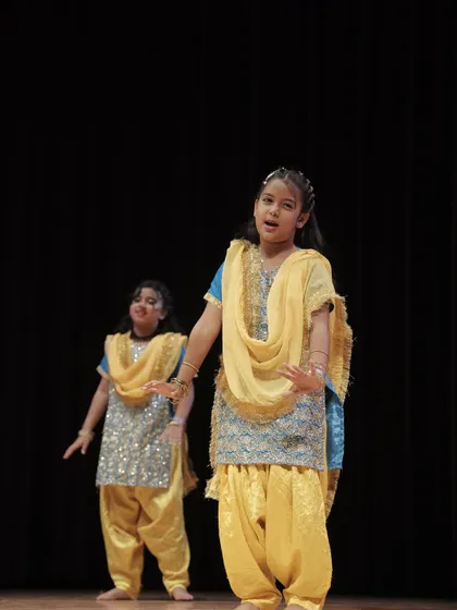 The 'Dancing Divaas' performing as a group, showcasing their synchronized movements.