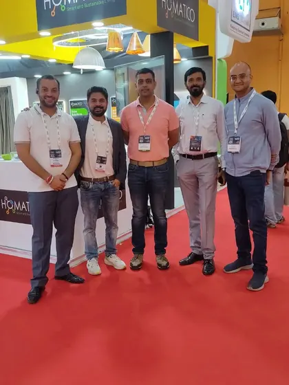 My team and I at our exhibition booth. We are a group of dedicated professionals ready to bring smart and sustainable technology to your home.