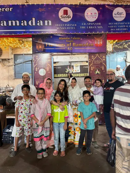A lovely family photo in front of our banner. We are happy to be a part of your memories.