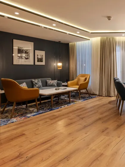 Additional views of the Radisson Resort, Khopoli, showcasing various interior and exterior details, from lobby seating areas and restaurant layouts to guest room configurations and architectural elements.