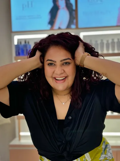 She is loving her new look, running her hands through her soft, defined curls. This is the result I aim for every time.