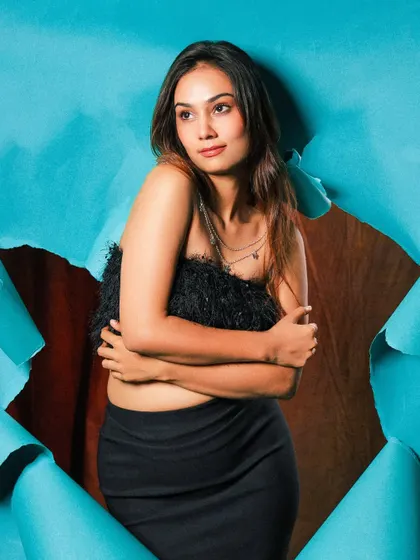 A softer moment from the torn paper shoot. This pose is more introspective, showing a different side of the story while still using the same powerful concept.