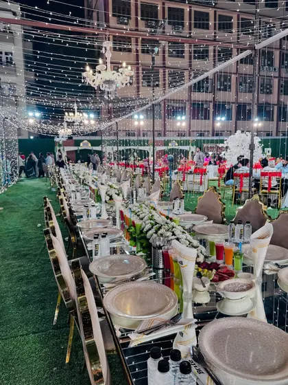 The long dining table setup, ready for a grand feast.