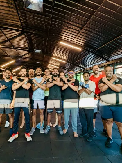 Our crew showing their strength and unity. We're a team that pushes each other to be better every single day.