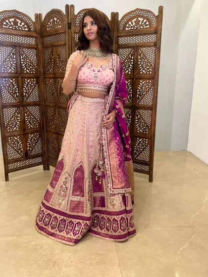 A full look at this unique pink and purple lehenga, perfect for a guest who loves color.
