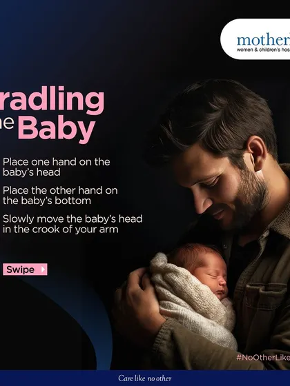 The cradle hold is a classic for a reason. We show you how to place one hand under the baby's head and the other under their bottom, then gently move their head into the crook of your arm for a secure and comfortable hold.